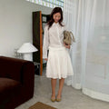 SOMETHING PERRY PLEATED SKIRT